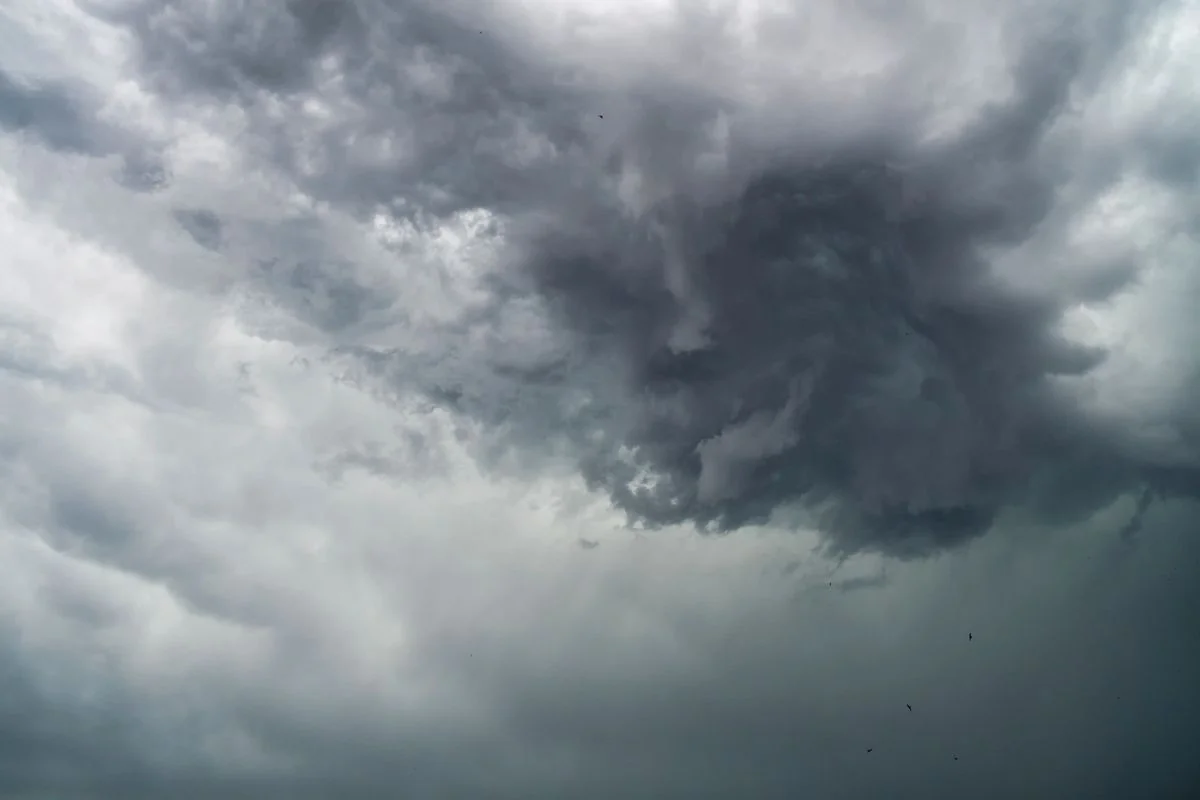 Storm clouds over Calgary, representing hail damage season